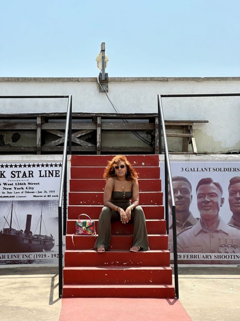 Farida Idris Mohamed on the steps at Cape Coast, Ghana
