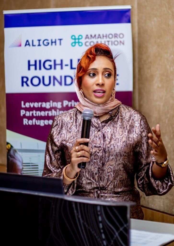 Farida Idris Mohamed speaking at the Alight and Amahoro Coalition high-level roundtable